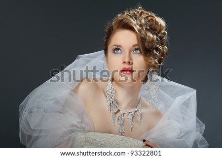 A portrait of beautiful white-headed girl is in weddings accessories wedding decoration