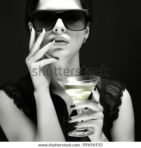 beautiful young girl with glass of martini beautiful young girl with glass of martini