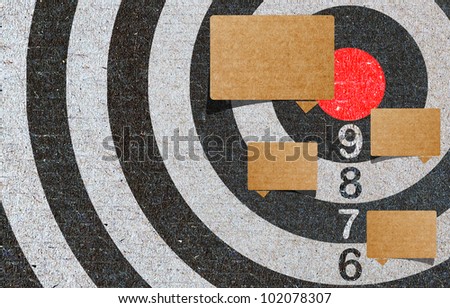 Abstract recycled paper craft , red target, note
