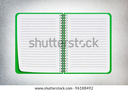 isolated green texture notebook on white,recycled paper craft stick on white background , open notebook on left side.