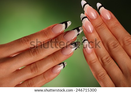 Beautiful Female Hands. Beautiful hand with perfect nail. Manicure.  Colourful Nail polish. Colourful nails.