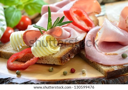 Snack with smoked ham and fresh farm-baked bread