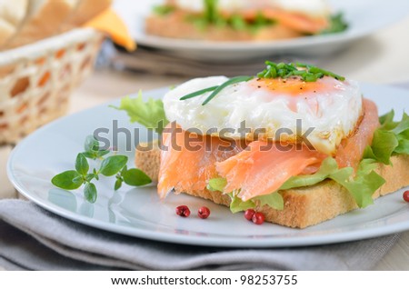 Toast with smoked salmon and heart shaped fried egg