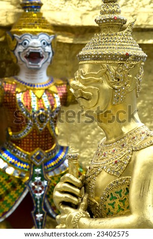 Couple demon statue at the Grand Palace in Bangkok, Thailand.