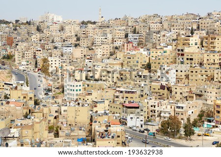 AMMAN, JORDAN - FEBRUARY 3: Amman city view of buildings and houses in Amman, Jordan on February 3rd, 2014. Amman the capital of Jordan spreads on seven hills.