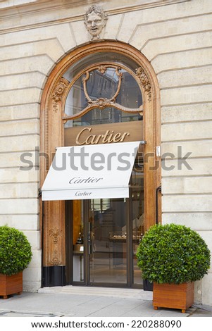 PARIS - JULY 8: Cartier shop in place Vendome in Paris. The company with its headquarters in Paris is now a wholly owned subsidiary of Compagnie FinanciÃ?ÃÂ¨re Richemont SA on July 8, 2014 in Paris.