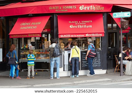 PARIS - JULY 5: Berthillon ice cream shop with people. Is one of the most famous ice cream and crepes parlor of the french capital on July 5, 2014 in Paris.