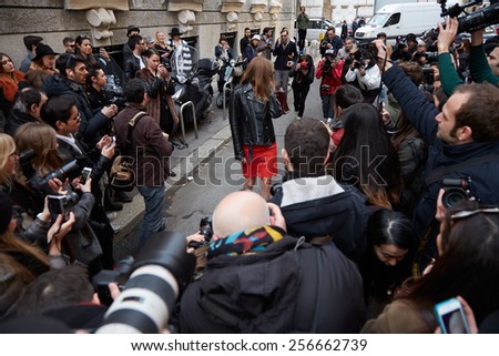 MILAN - FEBRUARY 25: Photographers shooting street style look before Alberta Ferretti show Milan Fashion Week Day 1, Fall/Winter 2015/2016 street style day 1, on February 25, 2015 in Milan.