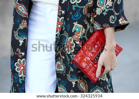 PARIS - SEPTEMBER 30: Helena Bordon poses for photographers with red Chanel bag before Rochas show, Paris Fashion Week Day 2, Spring / Summer 2016 street style on September 30, 2015 in Paris.