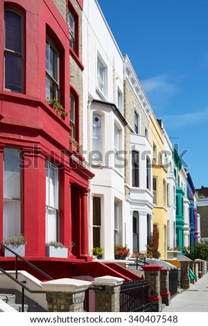 Colorful english houses facades in London near Portobello road