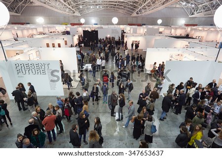 TURIN, ITALY - NOVEMBER 6: Artissima, contemporary art fair opening with people, galleries and art collectors on November 6, 2015 in Turin, Italy. Large group of people attending the fair opening.