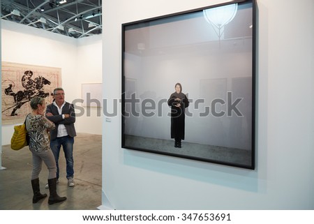 TURIN, ITALY - NOVEMBER 6: Artissima, contemporary art fair opening with people, galleries and art collectors on November 6, 2015 in Turin, Italy. Art photography and visitors at art fair opening.
