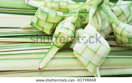 Ketupat: South East Asian rice cakes bundle, often prepared for festivities and celebratory occasions.