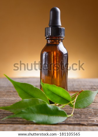 Pure organic essential oil in amber glass bottle
