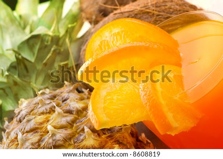 Tropical drink with orange, pineapple, coconut (margarita, sangria etc.)