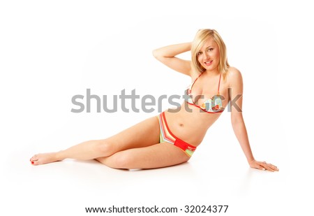 Beautiful blond girl wearing swimming costume, isolated over white background