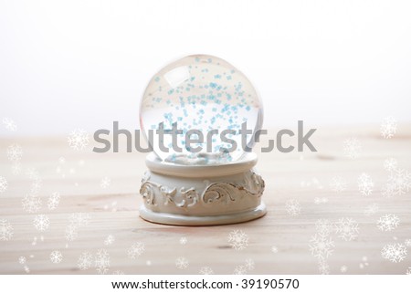 Snow globe with snow flakes, beautiful ornament