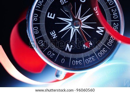Compass composition for traveler, conceptual colorphoto, suitable also as a background image
