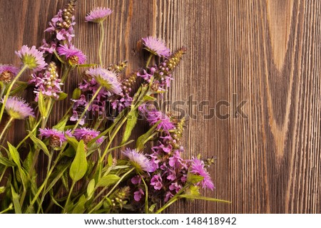 Herbal Background - flowers over Wood