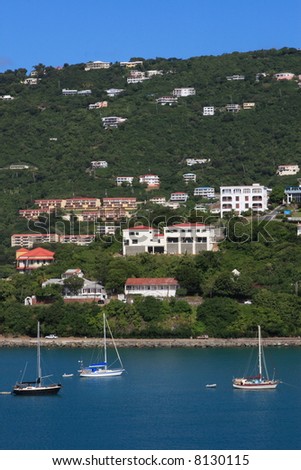Tropical houses on hill overlooking harbor. St Thomas US Virgin Islands