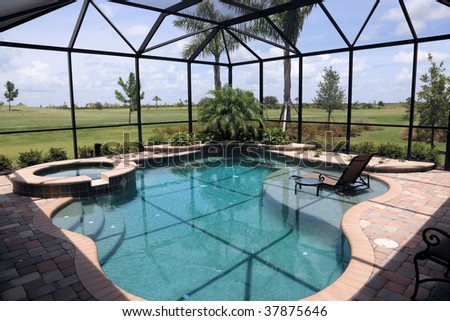 Screened in outdoor luxury swimming pool