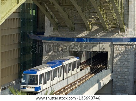 Underground Metro train underneath road bridge, Lausanne Switzerland