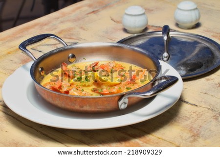 Shrimps in garlic butter sauce dish