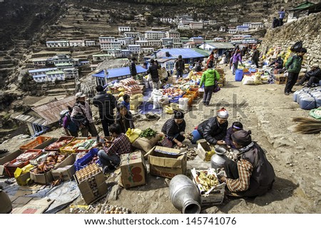 NAMCHE BAZAAR,NEPAL-APRIL 13:On Saturday a weekly market in the center of village.Sherpas from valleys spread ?ut the?r agricultural products at Namche Bazaar on April 13,2012 in Everest region,Nepal