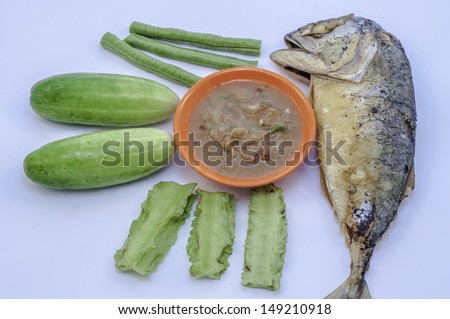 Fried Mackerel fish,chili sauce ,and fresh vegetable-isolated