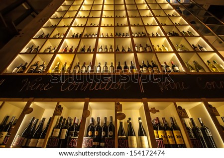 View of racks with wine bottles at wine cellar