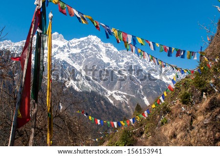 Himalayan Range with snow clad, and prayer flags in Lachen, North Sikkim, India.