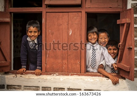 PELLING,INDIA-APRIL 17:The Indian students at the window in Pelling school on April 17,2013 in Pelling,India.
