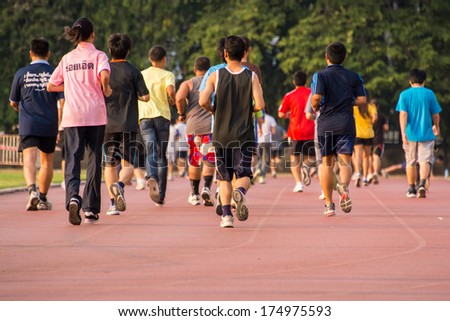 BANGKOK,THAILAND-FEB 02 :Unidentified runners running at a track and field stadium at Huamark stadium on February 02,2014 in Bangkok,Thailand.
