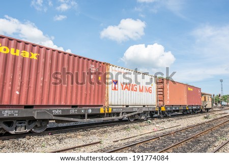 THUNGSONG,THAILAND-MARCH 31, 2014 : The Container Train on railway at Thungsong station in Thungsong of Thailand.
