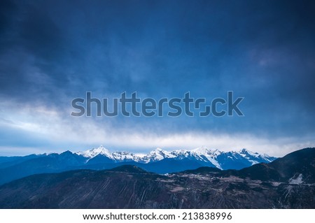 Meili Snow Mountain after sunset, also known as Kawa Karpo,northeast of Deqin County of Yunnan Province.