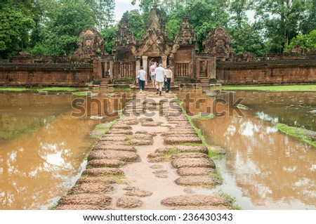 Siem Reap,Cambodia-October 03,2009 :Tourists visiting the Banteay Srei temple on flood situation in Siem Reap,Cambodia.Banteay Srei or Srey is a 10th century  temple dedicated to the Hindu god Shiva.