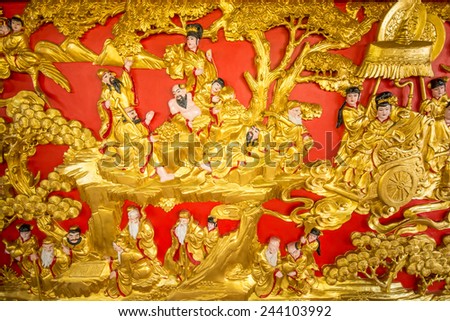 Suphan Buri, Thailand - November 22,2014 : Thai art painting at Heaven Dragon Shrine Park in Suphan Buri, Thailand.  The temple is regarded as the most sacred Buddhist temple (wat) in Thailand.