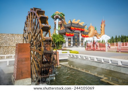Suphan Buri, Thailand - November 22,2014 :  Tourist visiting retro China town at Heaven Dragon Shrine Park in Suphan Buri, Thailand. This is new place of tourism in Suphan Buri, Thailand.