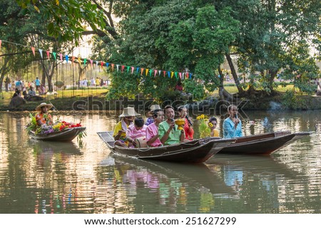 Bangkok, Thailand - December 10,2014 : Scene of King Rama 9 park with tradition boats procession on Rama 9 park festival in  Bangkok,Thailand.