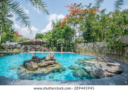Kanchanaburi , Thailand - May 12,2015 : View of the poolside  at  The Forest Resort  in Kanchanaburi, Thailand.