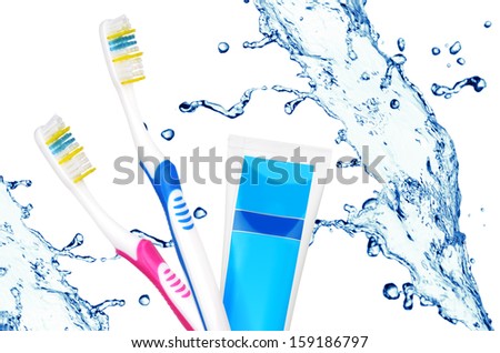 Toothbrushes and toothpaste tube other water splash. Tooth care concept