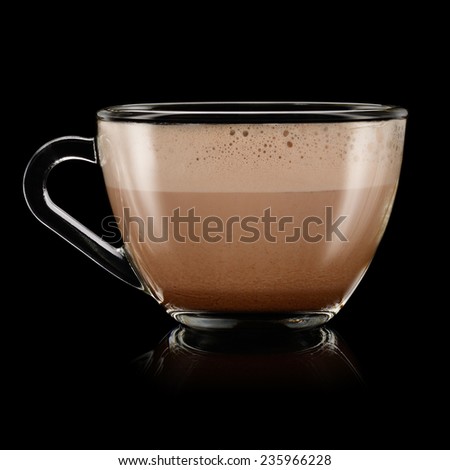 Cup of chocolate milkshake on black background