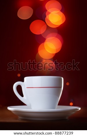 Coffee mug on abstract light background