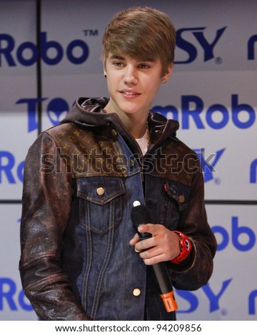 LAS VEGAS - JAN 11: Justin Bieber makes an appearance at the mRobo booth at the 2012 Consumer Electronics Show at The Las Vegas Convention Center in Las Vegas, NV on January 11,  2012.