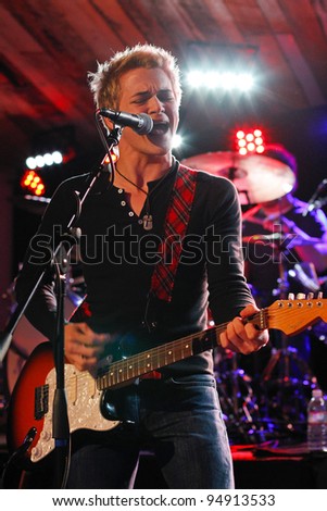 DENVER - AUG 25: Hunter Hayes performs in concert at Toby Keith\'s I Love This Bar & Grill in Denver, CO on August 25, 2011.