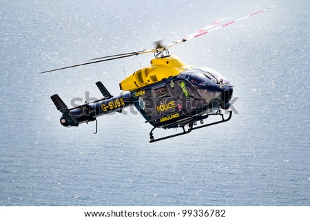 SEVEN SISTERS, UK - AUGUST 1: The Sussex police helicopter patrols over the Seven Sisters cliff tops on the south coast on 1 August, 2011.