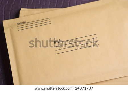 stock-photo-yellow-packaging-envelope-24