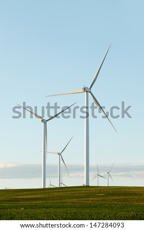 Wind turbines constructed in a farm field
