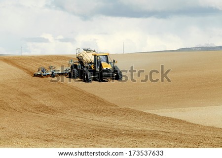 Ririe, Idaho, USA April 22, 2013 Farm machinery planting wheat in the spring.