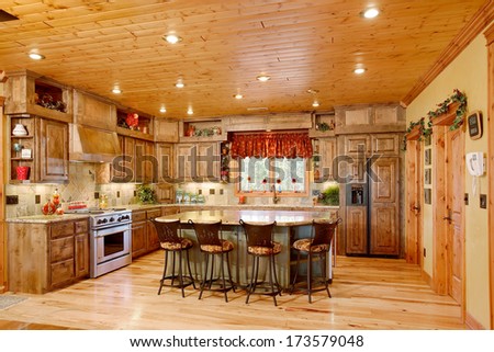 Island Park, Idaho, Usa Oct. 28, 2008 The Interior Of A Kitchen In A Residential Mountain Cabin , With A View Through The Windows.